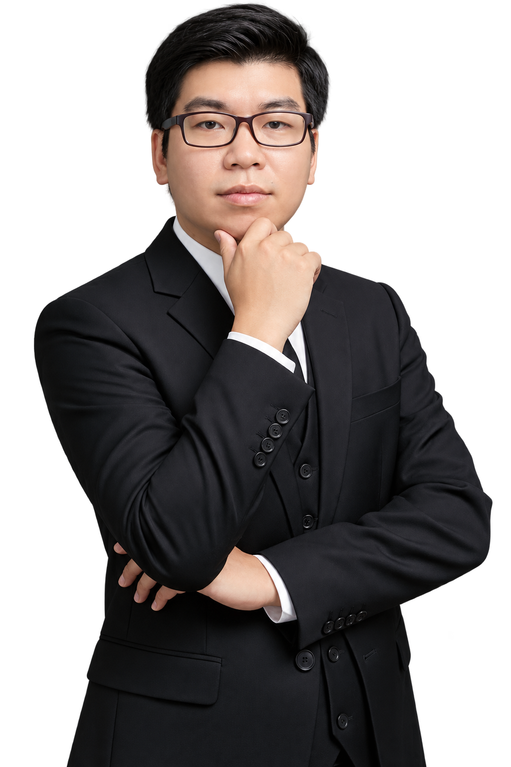 Đình Huy trong bộ vest đen, đeo kính và đặt tay dưới cằm